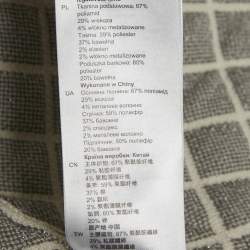 Pre Owned جاكيت ساندرو كريمي محبوك بتأثير مبطن وواجهة بخطاف مقاس صغير