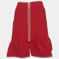 مملوكة مسبقًا تنورة ساندرو قصيرة متموجة تريكو اللون أحمر مقاس صغير