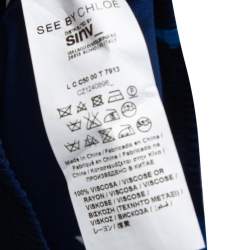 Pre Owned بلوزة سي باي كلوي خصر سموكد كريب طباعة نجوم كحلي مقاس متوسط