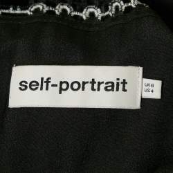 Pre Owned فستان ميدي سيلف بورتريت أسود دانتيل حلقات وحافة مموجة مقاس كبير - لارج