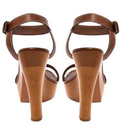 Pre Owned صندل سيرجيو روسي سير كاحل كعب ونعل سميك خشبي جلد بني مقاس 39