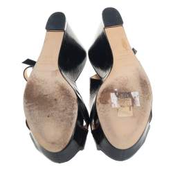 Pre Owned صندل سيرجيو روسي جلد أسود لامع كعب روكي نعل سميك بحزام للكاحل مقاس 39.5