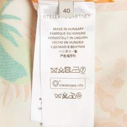 مملوكة مسبقًا بلوزة ستيلا مكارتني كريب برتقالي بطبعة زهور مقاس صغير (سمول)