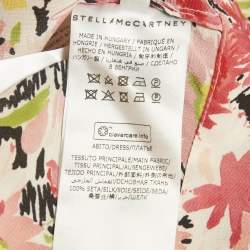 مملوكة مسبقًا تنورة وتوب ستيلا مكارتني حرير وردي بطبعة زهور صغيرة