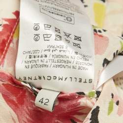 مملوكة مسبقًا تنورة وتوب ستيلا مكارتني حرير وردي بطبعة زهور صغيرة