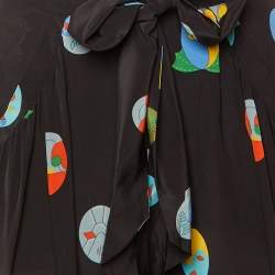 Pre Owned جمبسوت ستيلا مكارتني حرير أسود مطبوع سوبرهيرو مقاس متوسط - ميديم