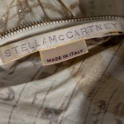 Pre Owned جاكت ستيلا ماكرتني منفوخ خفيف الوزن درابيه قطن مطبوع فويل ذهبي وكريمي مقاس صغير