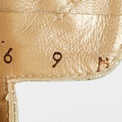 Pre Owned Stuart Weitzman Gold Texture Leather Tassel Pointed Toe Flat Mules Size 39.5