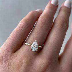 Pre Owned خاتم ألماس مصنع كمثري بوزن 1.5 قيراط من الذهب الأصفر عيار 18 بحجم 52.