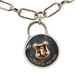 Pre Owned Tiffany & Co. Silver 18K Rose Gold Round Lock Charm Bracelet