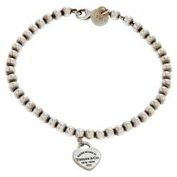 Pre Owned سوار تيفاني آند كو. ريترن تو تيفاني إيناميل أزرق بحلية قلب بخرز فضية