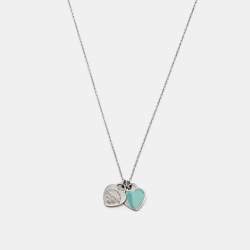 Return to Tiffany™ mini double heart tag pendant in silver with Tiffany  Blue enamel finish.