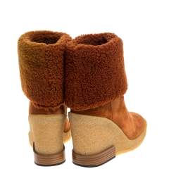 مملوكة مسبقًا Tod's Brown Shearling And Suede Leather Wedge Ankle Boots Size 37