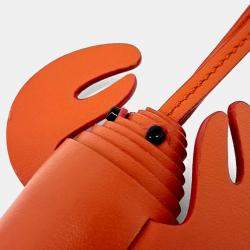 Pre Owned Tod's Orange Leather keyring and white charm