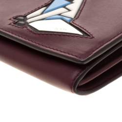 Tod's Bordeaux Leather Fox Detail Continental Wallet