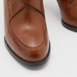 مملوكة مسبقًا Tod's Brown Leather Cross Strap Ankle Booties Size 36.5
