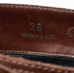 Pre Owned حذاء بوت تودز بيكر منتصف ركبة جلد بني مزين بإبزيم مقاس 38