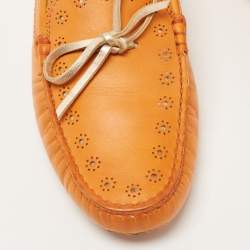 مملوكة مسبقًا Tod's Orange Perforated Leather Bow Slip On Loafers Size 40.5