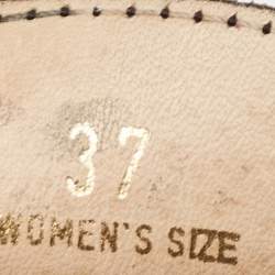 مملوكة مسبقًا حذاء لوفرز تودز جلد أسود بتصميم ليزر مقاس 37