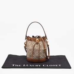 Pre Owned Tory Burch Brown/Beige Canvas and Leather Mini T Monogram Bucket Bag