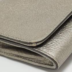 Pre Owned Tory Burch Metallic Grey Leather Logo Embossed Flap Clutch Bag