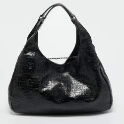 Pre Owned Tory Burch Black Logo Embossed Leather Dafina Hobo