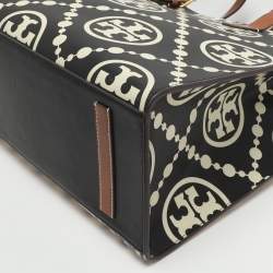 مملوكة مسبقًا حقيبة يد توتس توري برش حرف ت مونوغرام محفور جلد أسود/أبيض مظلل متباين