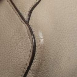 Pre Owned حقيبة ظهر توري برش بشعار رفرف جلد رمادي مزينة بشرابة