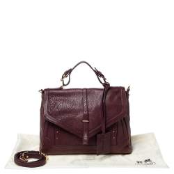 مملوكة مسبقًا حقيبة توري برش يد علوية جلد بنفسجية