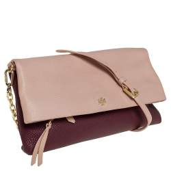 Pre Owned حقيبة كلتش توري برش جلد خوخي محبب/ أحمر داكن مطوية