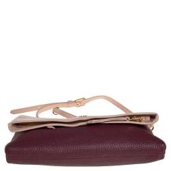 Pre Owned حقيبة كلتش توري برش جلد خوخي محبب/ أحمر داكن مطوية