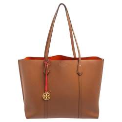 Tory Burch Perry Triple Compartment Pebbled Leather Tote Bag in black.