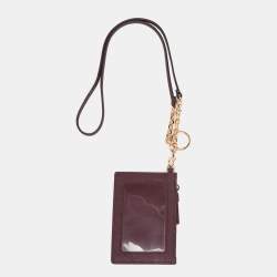 مملوكة مسبقًا حافظة بطاقة هوية توري برش جلد عنابية