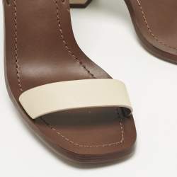 Pre Owned صندل توري برش كعب عريض جلد أزرق كحلي/كريمي مع حزام للكاحل مقاس 38.5