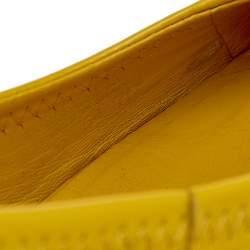 مملوكة مسبقًا حذاء كعب عالي توري برش سالي جلد أصفر لامع كعب روكي مقاس 37.5