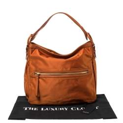 Pre Owned Tumi Orange Nylon Ashley Hobo