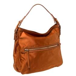 Pre Owned Tumi Orange Nylon Ashley Hobo