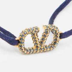 Pre Owned Valentino VLogo Signature Blue Crystal-Embellished Gold Tone Cord Bracelet