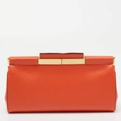 Pre Owned Valentino Orange Leather Rockstud Logo Plaque Clutch