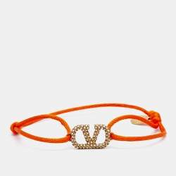 Pre Owned Valentino Vlogo Crystal Gold Tone Orange Cord Bracelet