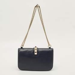 Pre Owned حقيبة فالنتينو جلد أزرق بحري قلاب مرصع روكستد قفل غلام متوسطة