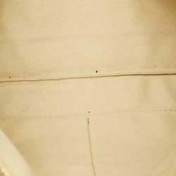 مملوكة مسبقًا Valentino Rockstud Yellow Leather Wristlet Clutch