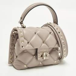 Pre Owned حقيبة فالنتينو يد علوية جلدي مبطن مرصعة بالشعارات الحمراء كانديستاد