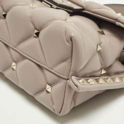 Pre Owned حقيبة فالنتينو يد علوية جلدي مبطن مرصعة بالشعارات الحمراء كانديستاد