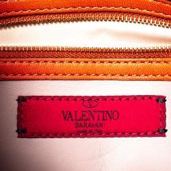 Pre Owned Valentino Orange Leather Rockstud Wristlet Clutch