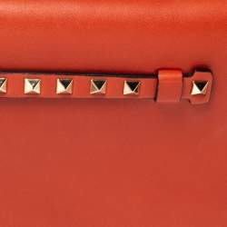 Pre Owned Valentino Orange Leather Rockstud Wristlet Clutch