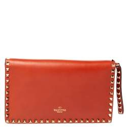 Pre Owned Valentino Orange Leather Rockstud Wristlet Clutch