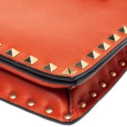 Pre Owned Valentino Orange Leather Rockstud Wristlet Clutch