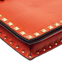 Pre Owned Valentino Orange Leather Rockstud Wristlet Clutch