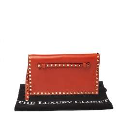 Pre Owned Valentino Orange Leather Rockstud Wristlet Clutch